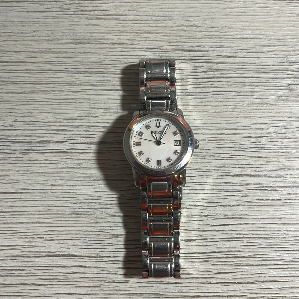 Bulova Watch Mother of Pearl Face Ladies Date Stainless Steel Round